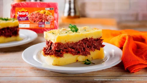 Escondidinho de jerked suíno com purê de batata-doce