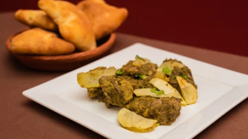 Frango à Cafreal com Farofa de Miúdos